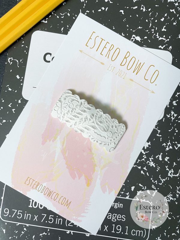 White Embossed Snap Clip